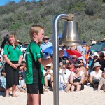 One of the school children from the Maheno School rings the ship’s bell.